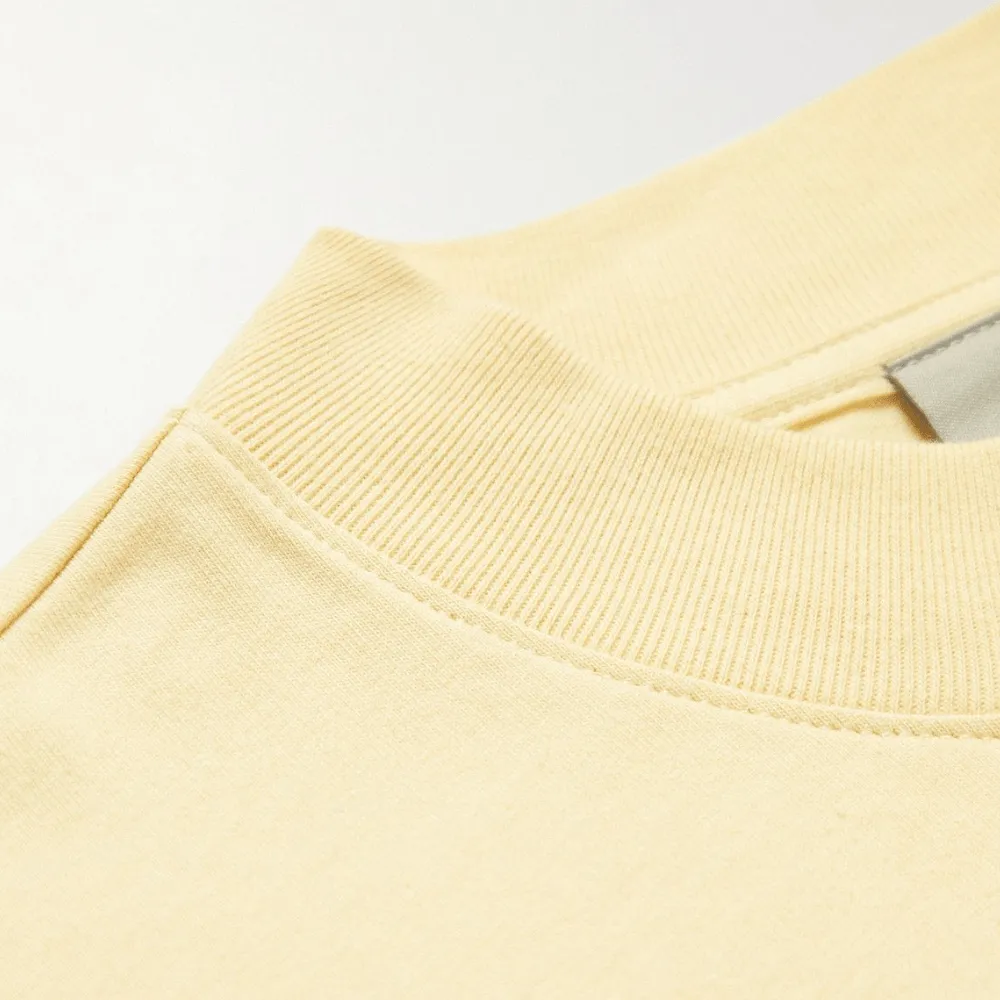 Fear of God ESSENTIALS Long Sleeve Tee with Appliquéd Logo Print