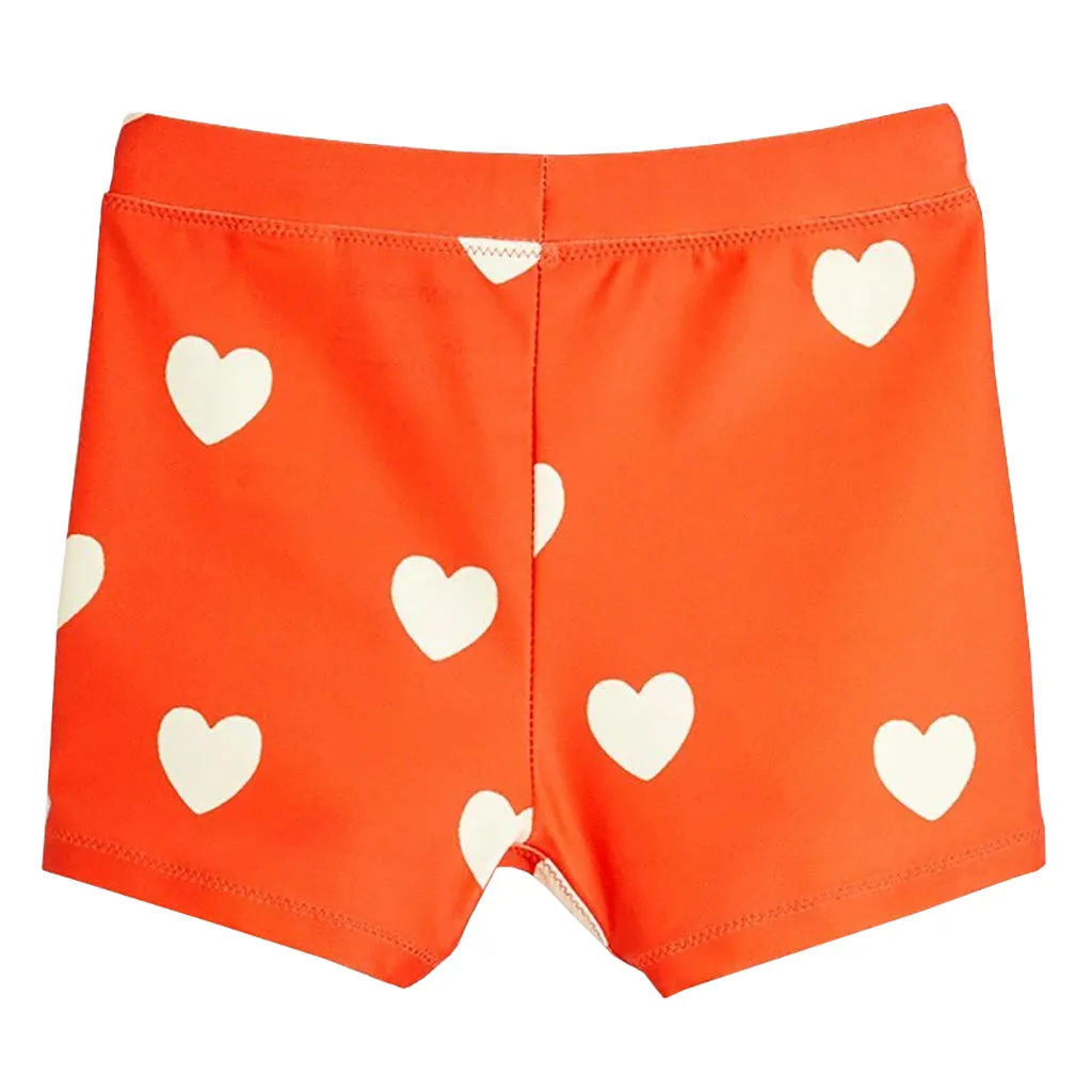 Red Child Hearts Swim Shorts by Mini Rodini