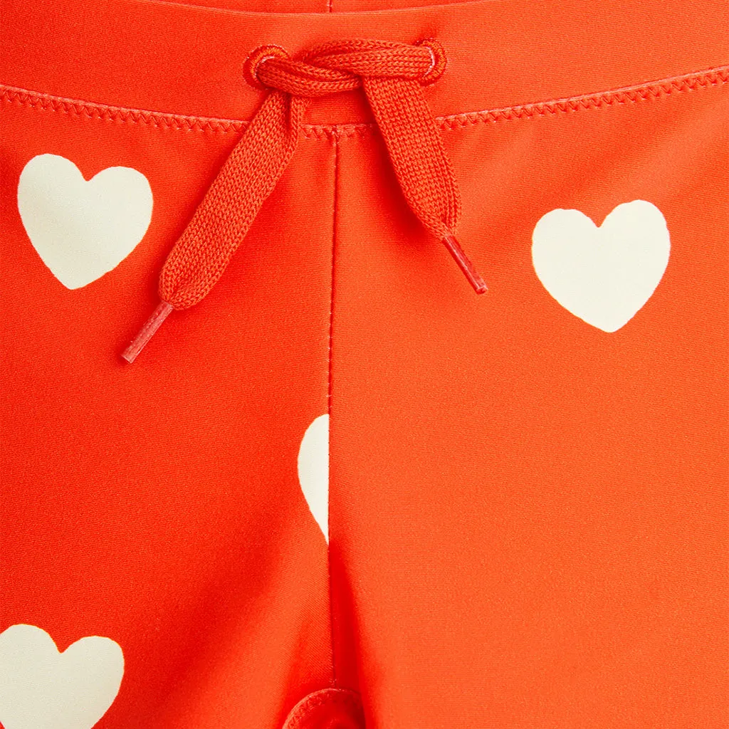 Red Child Hearts Swim Shorts by Mini Rodini