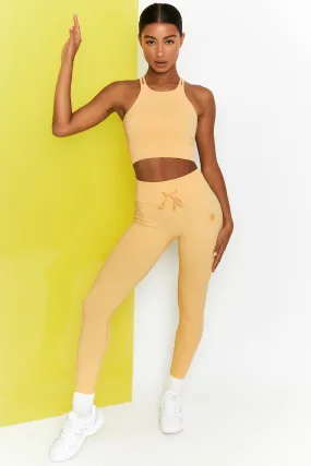 Yellow petite ribbed tie front full length leggings for women.